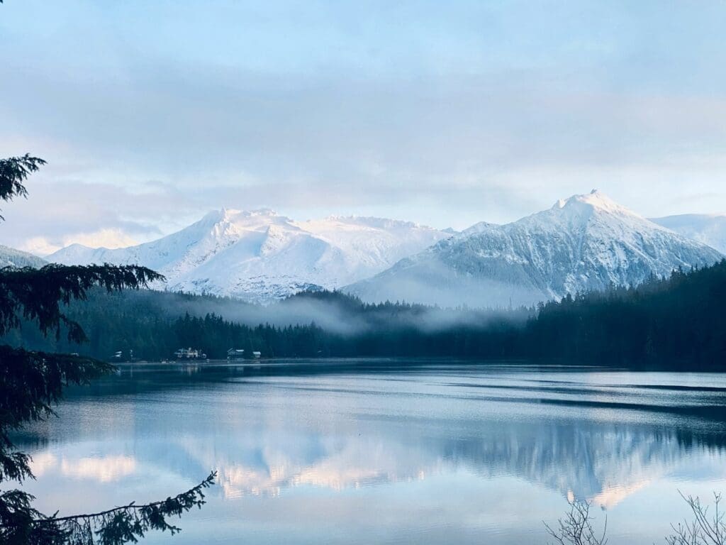 Alaskan lake and snow covered mountains, from an article about best places in the US