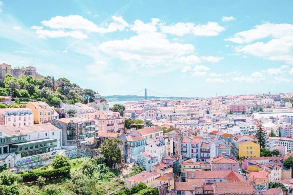 Image overlooking a European city on the coast, for an article "Is travel insurance worth it"